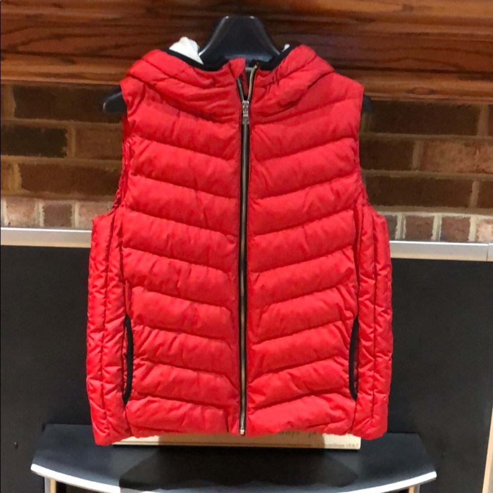 Red vest size Medium never worn